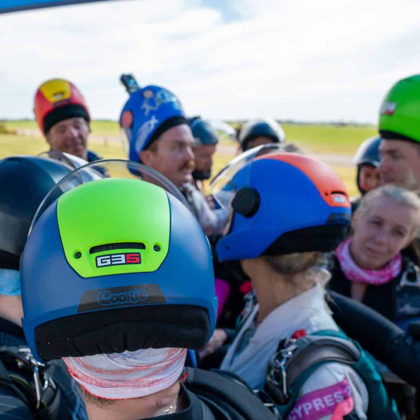 Group of skydivers wearing Cookie helmets