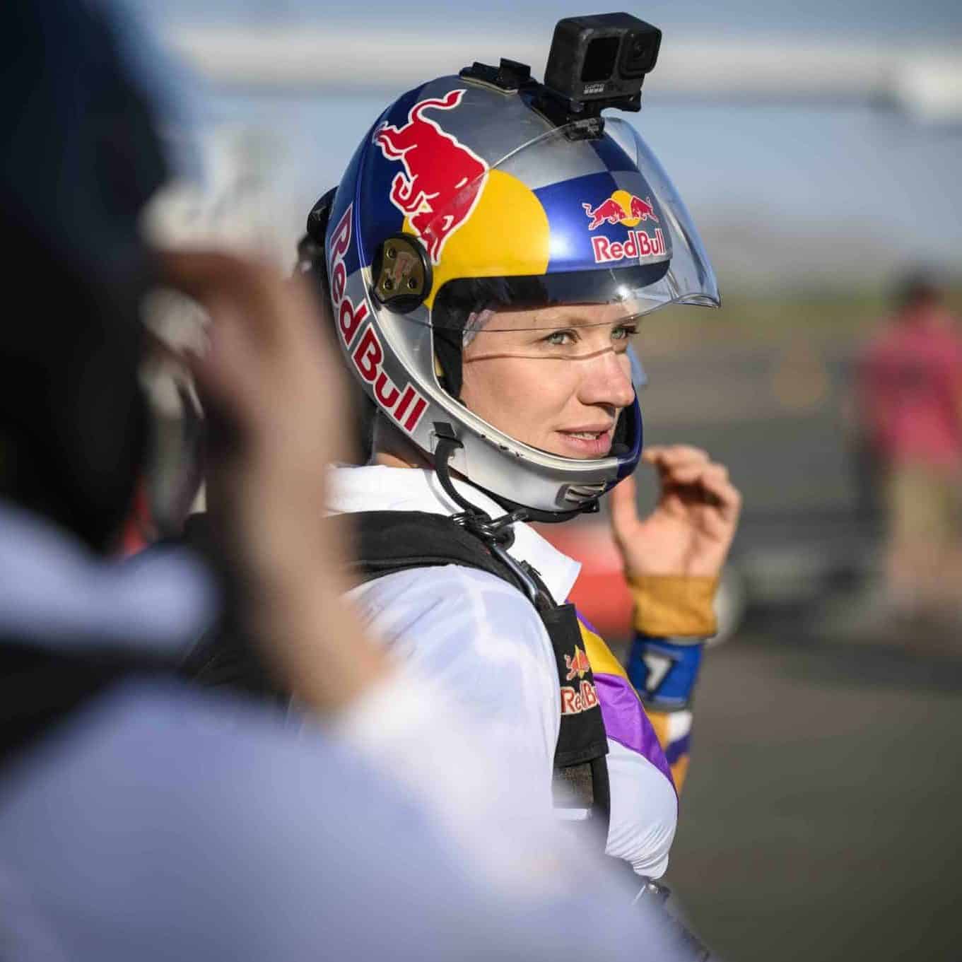 Skydiver wearing a Cookie helmet with Red Bull graphics